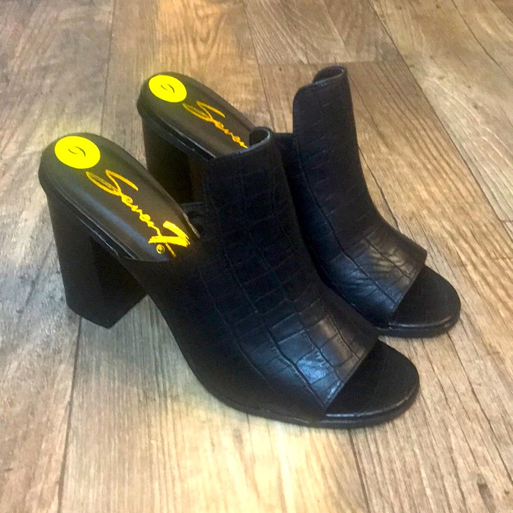Black heeled mules